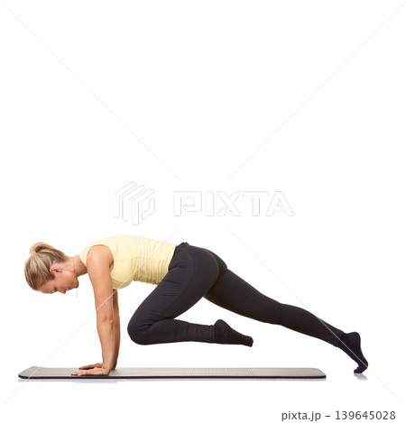 Woman, mountain climber and fitness on mat for exercise, workout or cardio challenge in studio on mockup white background. Profile of healthy lady training for strong core, wellness or plank on floor Woman, mountain climber and fitness on mat for exercise, workout or cardio challenge in studio on mockup white background. Profile of healthy lady training for strong core, wellness or plank on floor 139645028