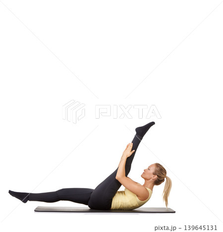 Woman, legs and stretching on yoga mat for gym flexibility, mockup space or white background. Female person, challenge and healthy wellness in studio for progress, splits practice or pilates training Woman, legs and stretching on yoga mat for gym flexibility, mockup space or white background. Female person, challenge and healthy wellness in studio for progress, splits practice or pilates training 139645131