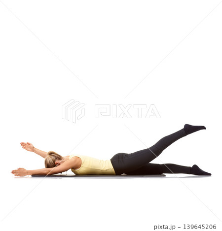 Woman, yoga and mat in studio for stretching, fitness or workout for healthy body, wellness or core muscle. Person, exercise or pilates on floor for abdomen health on mockup space or white background Woman, yoga and mat in studio for stretching, fitness or workout for healthy body, wellness or core muscle. Person, exercise or pilates on floor for abdomen health on mockup space or white background 139645206