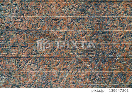 Abu Dhabi, United Arab Emirates - Jan 17 2024, close up view of ancient Egyptian hieroglyphs carved on a granite slab on exhibition of Louvre Abu Dhabi museum, Abu Dhabi, UAE Abu Dhabi, United Arab Emirates - Jan 17 2024, close up view of ancient Egyptian hieroglyphs carved on a granite slab on exhibition of Louvre Abu Dhabi museum, Abu Dhabi, UAE 139647801