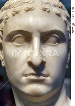 Abu Dhabi, United Arab Emirates - Jan 17 2024, Close-up view of the Queen's Head, an ancient sculpture on the exhibition at the Louvre Abu Dhabi Museum, Abu Dhabi, United Arab Emirates Abu Dhabi, United Arab Emirates - Jan 17 2024, Close-up view of the Queen's Head, an ancient sculpture on the exhibition at the Louvre Abu Dhabi Museum, Abu Dhabi, United Arab Emirates 139647810