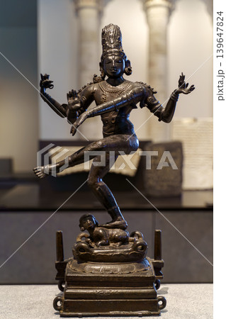 Abu Dhabi, United Arab Emirates - Jan 17 2024, Close-up view of a bronze statuette of dancing Shiva, a Hindu deity, on exhibition of museum Louvre Abu Dhabi, UAE Abu Dhabi, United Arab Emirates - Jan 17 2024, Close-up view of a bronze statuette of dancing Shiva, a Hindu deity, on exhibition of museum Louvre Abu Dhabi, UAE 139647824