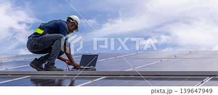 Engineer service check installation solar cell on the roof of factory. Engineer service check installation solar cell on the roof of factory. 139647949