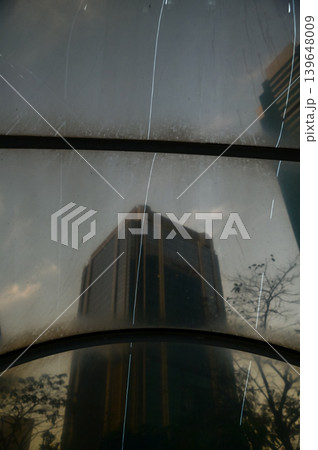 The scene of skyscapers of Hong Kong from low angle view from the tunnel. Hong Kong cityscape. Modern Buildings. Building exterior. Travel concept. The scene of skyscapers of Hong Kong from low angle view from the tunnel. Hong Kong cityscape. Modern Buildings. Building exterior. Travel concept. 139648009