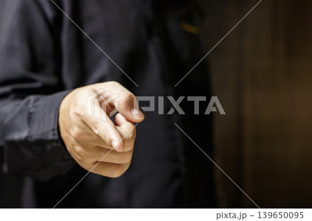 Man Pointing Finger at Viewer. Hand Gesture. Business Communication. Business and Education Concept. High quality photo Man Pointing Finger at Viewer. Hand Gesture. Business Communication. Business and Education Concept. High quality photo 139650095