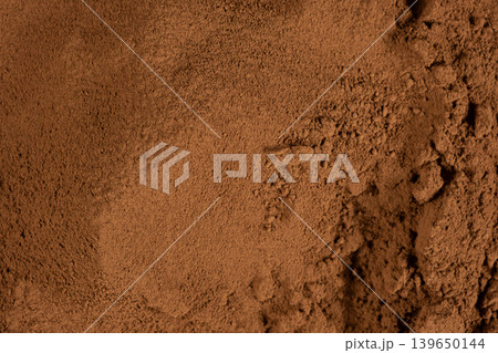 Raw organic cocoa powder texture background for food design Raw organic cocoa powder texture background for food design 139650144