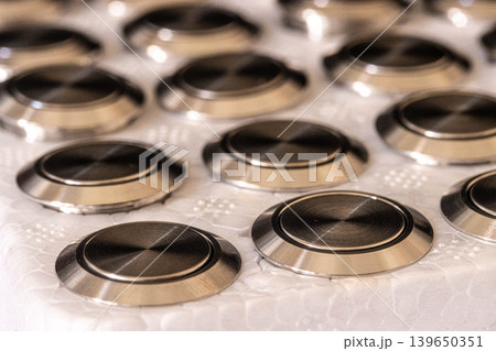 Stainless Steel Push Button Switches Repetitive Pattern Stainless Steel Push Button Switches Repetitive Pattern 139650351