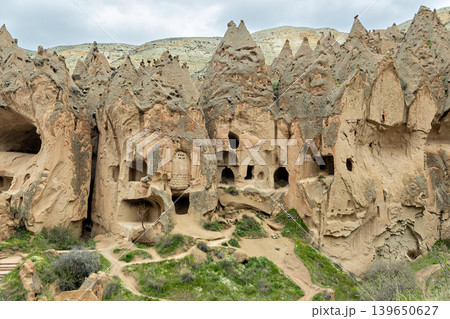 Ancient rock-cut cave dwellings in Cappadocia, Turkey 139650627