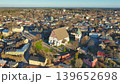 Porvoo, Finland - December 08, 2020: Aerial perspective of a picturesque town featuring a historic church surrounded by colorful buildings and lush greenery, showcasing urban beauty 139652698