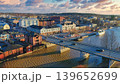 Porvoo, Finland - December 08, 2020: Aerial view showcases a vibrant cityscape with a river and bridge, highlighting colorful buildings and urban life along the waterfront 139652699