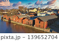 Porvoo, Finland - December 08, 2020: Scenic view of colorful wooden houses along the riverbank in Finland, showcasing charming architecture and natural beauty 139652704
