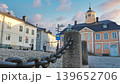 Porvoo, Finland - December 08, 2020: Historic architecture featuring cobblestone street, decorative chain, and colorful buildings, creating a charming urban atmosphere 139652706