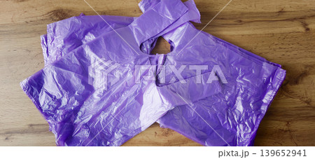 Plastic bags contribute to pollution and harm the planet's environment daily Plastic bags contribute to pollution and harm the planet's environment daily 139652941