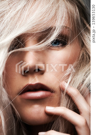 Portrait, woman and beauty in studio by haircare, make up and cosmetics by confident in foundation. Model, face and pride in glow in relax wellness and blonde hair by conditioner results as color Portrait, woman and beauty in studio by haircare, make up and cosmetics by confident in foundation. Model, face and pride in glow in relax wellness and blonde hair by conditioner results as color 139653130