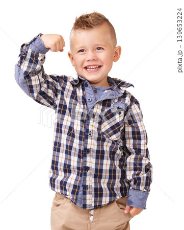 Happy boy, flex and fashion with hair style and checkered shirt standing isolated on a white studio background. Face of young little child, kid or male person smile showing muscle in casual clothing 139653224