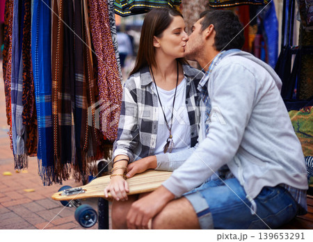 Love, kiss and couple skating in city together for travel, outdoor vacation or overseas holiday. Skateboard, street or sidewalk with man and woman tourist in urban town for sightseeing at market Love, kiss and couple skating in city together for travel, outdoor vacation or overseas holiday. Skateboard, street or sidewalk with man and woman tourist in urban town for sightseeing at market 139653291