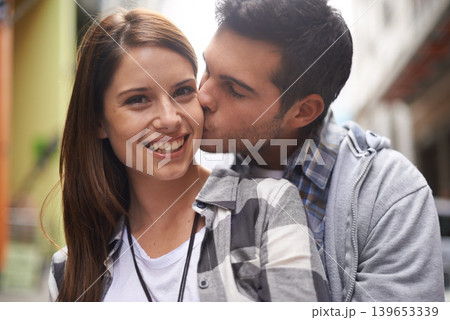 Love, portrait and happy couple hug, kiss and together for outdoor date, bonding and romantic affection. Wellness, happiness and face of boyfriend, girlfriend or people smile for relationship care Love, portrait and happy couple hug, kiss and together for outdoor date, bonding and romantic affection. Wellness, happiness and face of boyfriend, girlfriend or people smile for relationship care 139653339