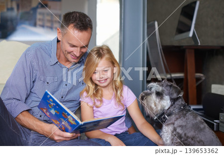 Father, child and reading book for learning at home, story and fantasy fiction for education. Daddy, daughter and dog bonding together, literacy and storytelling for language development or growth 139653362