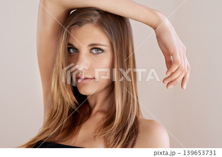 Confident, makeup and portrait of young woman with natural, glow and glamour facial routine. Beauty, cosmetics and serious attractive female person with self care, dermatology and face treatment. 139653731