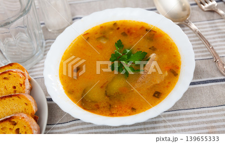 Popular dish of Russian cuisine is Pickle soup Popular dish of Russian cuisine is Pickle soup 139655333