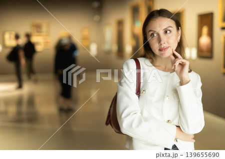 Girl view pictures and icons in museum hall Girl view pictures and icons in museum hall 139655690