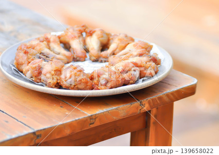 fried chick with fried garlic or chicken wings or deep fried chicken , fried chicken fried chick with fried garlic or chicken wings or deep fried chicken , fried chicken 139658022