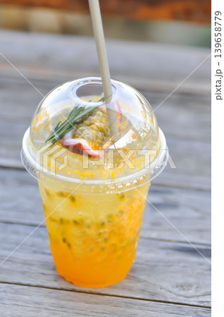 passion fruit juice , passion fruit soda or mocktail or cocktail 139658779