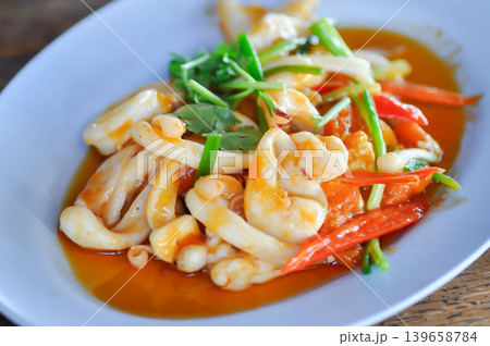 stir fried squid with vegetable, curry squid or squid salad stir fried squid with vegetable, curry squid or squid salad 139658784