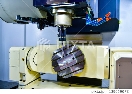 5 Axis CNC milling machine precision manufacturing process, metalworking industry. 5 Axis CNC milling machine precision manufacturing process, metalworking industry. 139659078