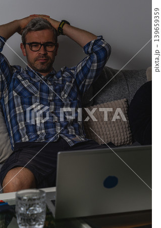 Man suffering anxiety during remote work 139659359