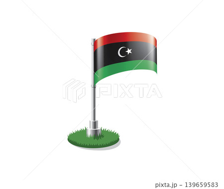 Libyan flag on a flagpole mounted on the grass Libyan flag on a flagpole mounted on the grass 139659583