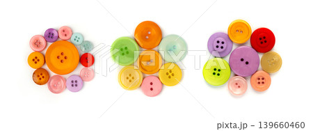 Multicolored sewing buttons isolated. Plastic sew buttons of different colors and sizes Multicolored sewing buttons isolated. Plastic sew buttons of different colors and sizes 139660460