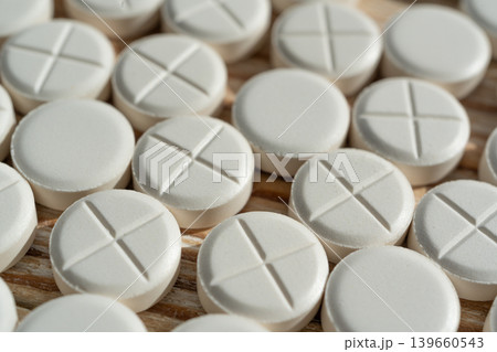 White medicine pills closeup, macro pattern 139660543