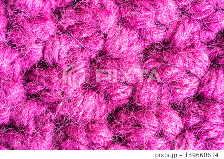 Knitted woolen fabric pattern in rich magenta Knitted woolen fabric pattern in rich magenta 139660614