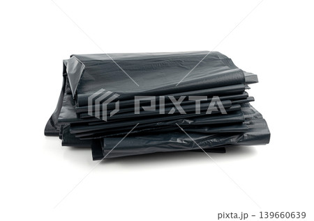 Garbage Bag Isolated. Folded Trash Package, New Rolled Plastic Bin Bags, Black Polyethylene Container Garbage Bag Isolated. Folded Trash Package, New Rolled Plastic Bin Bags, Black Polyethylene Container 139660639