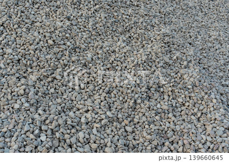 Construction gravel pattern, crushed grey stone textured background 139660645