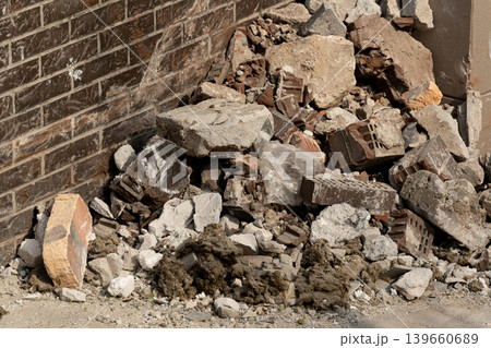 Broken rubble and concrete wall textured background Broken rubble and concrete wall textured background 139660689