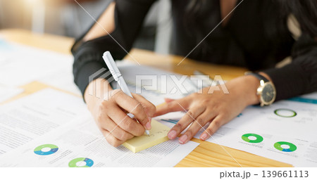 Hands, business person and data analysis, writing on sticky note and paperwork review with graphs and information. Statistics, analytics and infographic documents with planning and market research Hands, business person and data analysis, writing on sticky note and paperwork review with graphs and information. Statistics, analytics and infographic documents with planning and market research 139661113