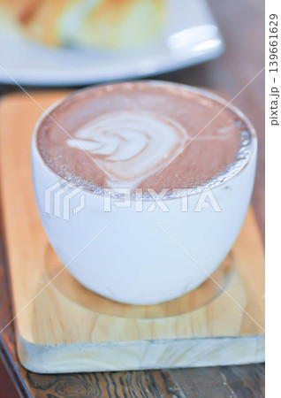 hot cocoa or hot chocolate and croissant hot cocoa or hot chocolate and croissant 139661629