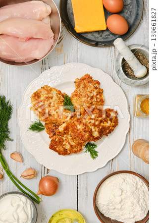 Cooking chicken fritters in the kitchen with fresh ingredients and spices on the table Cooking chicken fritters in the kitchen with fresh ingredients and spices on the table 139661827