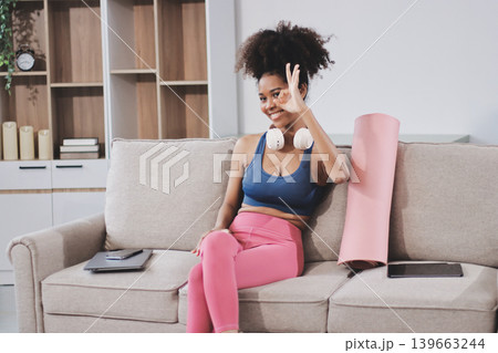Women exercising in fitness studio yoga classes 139663244