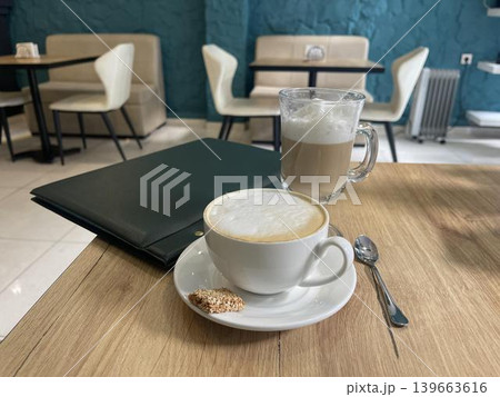 cup of coffee on the table in restaurant 139663616