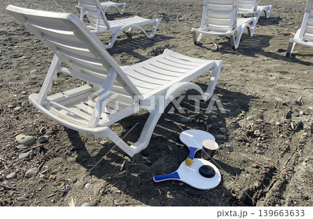 sun loungers for relaxing on the beach on a sunny day 139663633