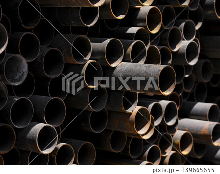 old rusty pipes in the junkyard 139665655