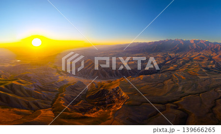 Sunrise Over Mountainous Arid Landscape with Villages in Kyrgyzstan Sunrise Over Mountainous Arid Landscape with Villages in Kyrgyzstan 139666265