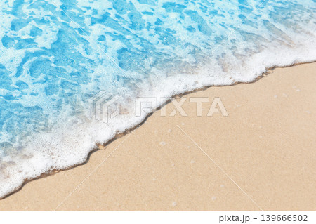 Detailed beach background with foamy turquoise water and smooth sand. Commercially useful minimal image for travel, resort, summer and advertising design. Detailed beach background with foamy turquoise water and smooth sand. Commercially useful minimal image for travel, resort, summer and advertising design. 139666502
