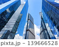 View of modern glass skyscrapers in financial district. Contemporary corporate architecture symbolizing business, finance and urban development. 139666528