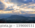 Beautiful sunrise over mountainous landscape in Luang Prabang, Laos. Soft light, clouds and mist create peaceful and atmospheric scenery. 139666531