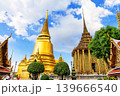 Stunning view of Wat Phra Kaew in Bangkok, Thailand, featuring golden stupas and intricate temple architecture. 139666540