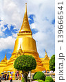 Bright golden pagoda at Wat Phra Kaew, one of the most famous landmarks in Bangkok, Thailand. 139666541